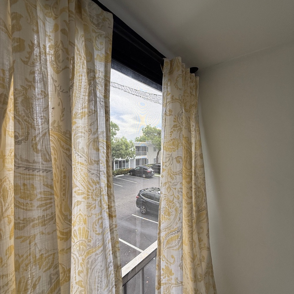 Elegant Yellow and White Patterned Curtains
